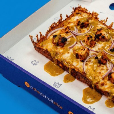 Detroit-style chicken pizza with crispy caramelised edges